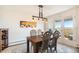 Bright dining room with balcony access offers an airy feel and plenty of natural light at 1029 E 8Th Ave # 1302, Denver, CO 80218