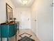 Entryway with decorative tile and stylish hall table creates an inviting space at 1029 E 8Th Ave # 1302, Denver, CO 80218