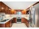 Updated kitchen featuring stainless steel appliances, granite countertops and ample cabinet space at 1029 E 8Th Ave # 1302, Denver, CO 80218