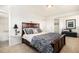 Inviting main bedroom features plush carpeting, a king bed, and a serene atmosphere at 1029 E 8Th Ave # 1302, Denver, CO 80218