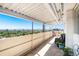 Spacious covered patio featuring panoramic views of the city and surrounding landscape at 1029 E 8Th Ave # 1302, Denver, CO 80218