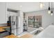 Updated kitchen featuring stainless steel appliances, butcher block countertops, and ample natural light at 8755 W Cornell Ave # 14-5, Lakewood, CO 80227