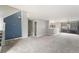 Bright and open living area with staircase and view of kitchen with modern appliances, and ample space at 8755 W Cornell Ave # 14-5, Lakewood, CO 80227