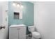 Clean powder room features a modern vanity, ample lighting, and fresh paint at 8755 W Cornell Ave # 14-5, Lakewood, CO 80227