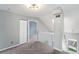 Spacious upstairs landing with natural light and access to multiple rooms, offering versatile living space at 8755 W Cornell Ave # 14-5, Lakewood, CO 80227
