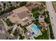 Enjoy community amenities like a pool, tennis courts, and amphitheater in this aerial view at 9687 Timbervale Ct, Highlands Ranch, CO 80129