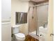 Bathroom features a toilet, vanity with sink, and shower with glass doors at 9687 Timbervale Ct, Highlands Ranch, CO 80129