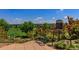 Civic Green Park's lawn, landscaping, signage, and rules posted at 9687 Timbervale Ct, Highlands Ranch, CO 80129