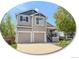 Charming two-story home with a two-car garage and well-manicured lawn at 9687 Timbervale Ct, Highlands Ranch, CO 80129