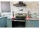 Modern kitchen with stainless steel appliances and stylish backsplash at 9687 Timbervale Ct, Highlands Ranch, CO 80129