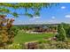 Beautiful community park with green space, pavilion, and water feature for relaxation and recreation at 9687 Timbervale Ct, Highlands Ranch, CO 80129