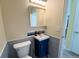 Stylish powder room with a modern vanity and decorative tile at 9687 Timbervale Ct, Highlands Ranch, CO 80129