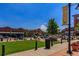 Charming town center with shops, restaurants, and green spaces, creating a welcoming community atmosphere at 9687 Timbervale Ct, Highlands Ranch, CO 80129