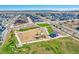 Aerial view showcasing a neighborhood playground with modern equipment and landscaping at 8403 Rush Creek Ave, Littleton, CO 80125