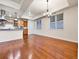 Bright dining area with wood floors and large windows with blinds at 2200 S University Blvd # 105, Denver, CO 80210