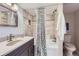 Modern bathroom with tiled shower, updated fixtures, and plenty of natural light at 1050 N Corona St # 304, Denver, CO 80218