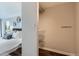 Walk-in closet with hardwood floors, custom shelving, and ample storage space at 1050 N Corona St # 304, Denver, CO 80218