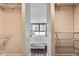 Bedroom closet with built in shelving and organized racks at 1050 N Corona St # 304, Denver, CO 80218