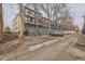 Modern apartment building featuring dedicated parking spaces for residents at 1050 N Corona St # 304, Denver, CO 80218