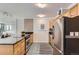 Modern kitchen featuring stainless steel appliances and light wooden cabinetry at 1050 N Corona St # 304, Denver, CO 80218