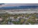 Aerial view of homes nestled in a community with mountain views in the background at 345 Scrub Oak Way, Monument, CO 80132