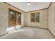 Bright bedroom with multiple windows showcasing lovely views at 345 Scrub Oak Way, Monument, CO 80132