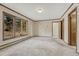 Spacious bedroom featuring a large window and neutral carpeting at 345 Scrub Oak Way, Monument, CO 80132