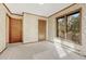 Comfortable bedroom featuring a sunlit window and ample closet space at 345 Scrub Oak Way, Monument, CO 80132