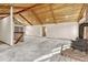 Expansive living room with vaulted wood ceilings, fireplace, and multiple access points at 345 Scrub Oak Way, Monument, CO 80132