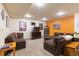 Basement featuring an entertainment area with a large sectional sofa at 9400 E Iliff Ave # 411, Denver, CO 80231