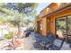 Inviting patio featuring a table set and plants, ideal for outdoor dining and entertaining at 9400 E Iliff Ave # 411, Denver, CO 80231
