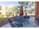 Outdoor patio with seating and potted plants perfect for relaxing and entertaining at 9400 E Iliff Ave # 411, Denver, CO 80231