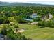 Aerial view showcasing green spaces, clubhouse and neighborhood amenities, offering a scenic and active lifestyle at 9502 W Hialeah Pl, Littleton, CO 80123