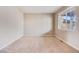 Spacious bedroom with neutral carpet, natural light, and ample space for furniture at 10294 E Telluride Ct, Commerce City, CO 80022