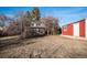 Large backyard with mature trees and detached garage at 8550 E Davies Pl, Centennial, CO 80112