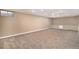 Spacious finished basement with neutral carpeting at 8550 E Davies Pl, Centennial, CO 80112