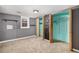 Basement bedroom with carpeting and built-in shelving at 8550 E Davies Pl, Centennial, CO 80112