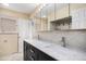 Bathroom with double vanity and marble countertop at 8550 E Davies Pl, Centennial, CO 80112