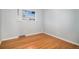 Bright bedroom with hardwood floors and window at 8550 E Davies Pl, Centennial, CO 80112