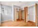 Bedroom with hardwood floors and double closets at 8550 E Davies Pl, Centennial, CO 80112