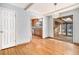 Bright dining room with hardwood floors and view to kitchen at 8550 E Davies Pl, Centennial, CO 80112