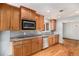 Kitchen with wood cabinets, granite countertops and stainless steel appliances at 8550 E Davies Pl, Centennial, CO 80112