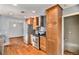 Kitchen with wood cabinets, granite countertops and stainless steel appliances at 8550 E Davies Pl, Centennial, CO 80112