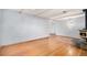 Living room with hardwood floors and a wood burning stove at 8550 E Davies Pl, Centennial, CO 80112