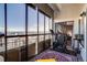 Enclosed balcony with floor to ceiling windows offers stunning city views and exercise area at 800 N Pearl St # 1207, Denver, CO 80203