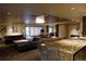 Spacious lounge featuring sofas, coffee table, dining area, and granite countertop bar area at 800 N Pearl St # 1207, Denver, CO 80203