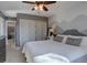 Bedroom with soft natural light, mountain mural, and closet at 8354 S Everett Way # C, Littleton, CO 80128