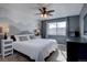 Bright bedroom features a large window and a calming mountain mural on the wall at 8354 S Everett Way # C, Littleton, CO 80128