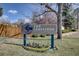 Entrance sign to The Crossings at Chatfield community with flower bed at 8354 S Everett Way # C, Littleton, CO 80128