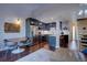 Modern kitchen showcasing dark cabinets, stainless appliances, and an open layout for entertaining at 8354 S Everett Way # C, Littleton, CO 80128